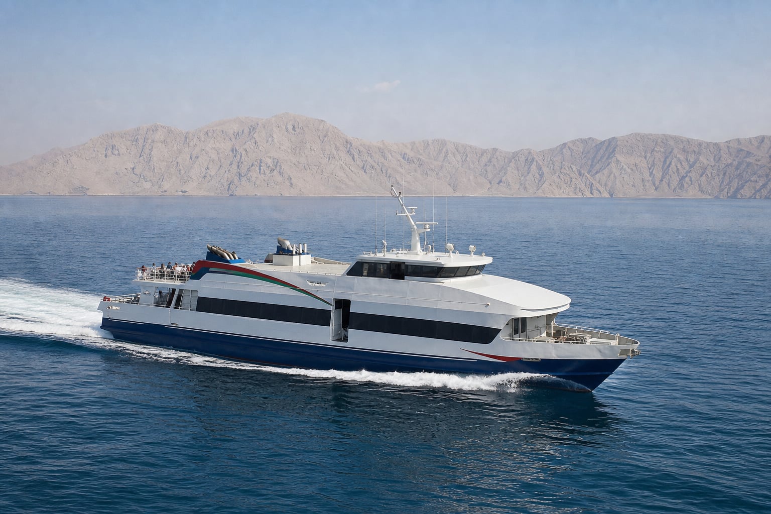 NFC Ferry traversing between Shinas and Khasab in Oman